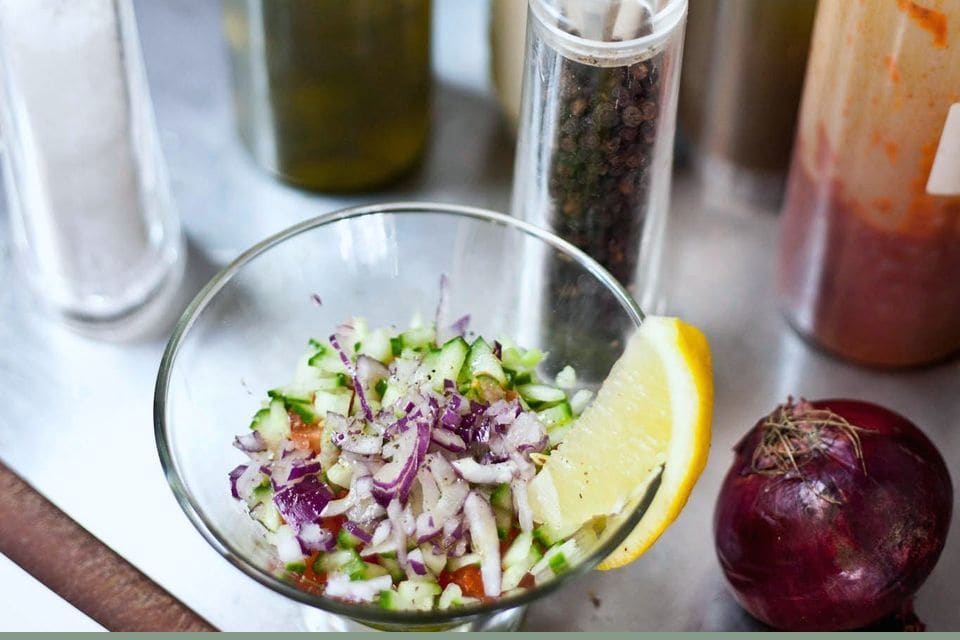 Chopped salad being made at the counter
